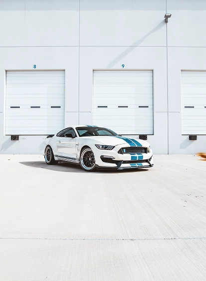 White Mustang with Blue Le Mans stripes